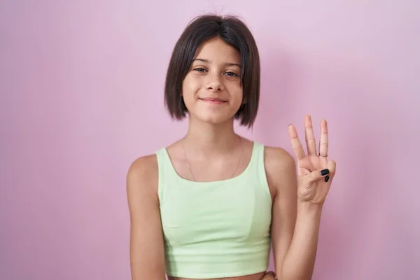 Young Girl Standing Pink Background Showing Pointing Fingers Number Three — Stock Photo, Image