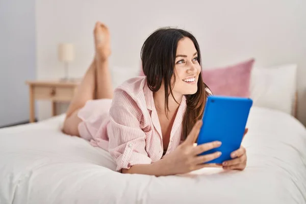 Young Woman Using Touchpad Lying Bed Bedroom — Stockfoto