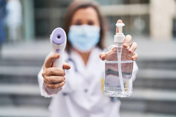 Middle Age Woman Wearing Doctor Uniform Medical Mask Holding Thermometer — Foto Stock