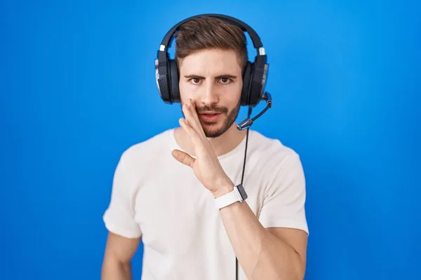 Hispanic Man Beard Listening Music Wearing Headphones Hand Mouth Telling — Stock Photo, Image