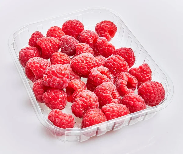 Delicious Group Raspberries Plastic Box Isolated White Background — Stock Photo, Image