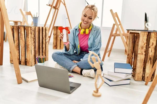 Young Caucasian Woman Artist Holding Diploma Sitting Floor Art Studio — Stock Photo, Image