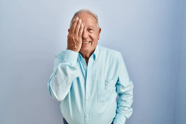 Senior Man Grey Hair Standing Blue Background Covering One Eye — Stock Photo, Image