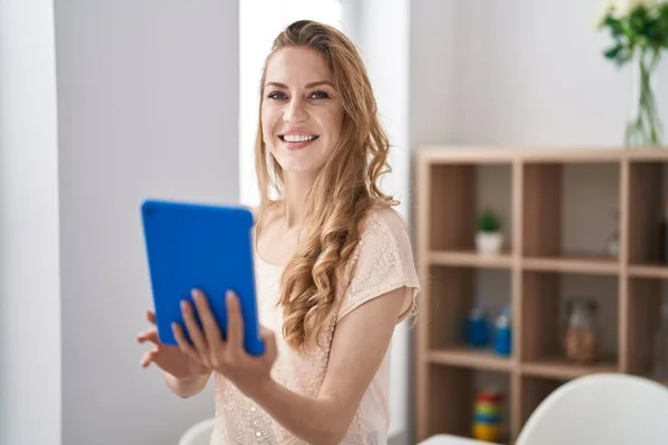 Young Blonde Woman Smiling Confident Using Touchpad Home — Photo
