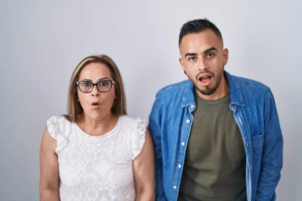 Hispanic Mother Son Standing Together Afraid Shocked Surprise Amazed Expression — Zdjęcie stockowe