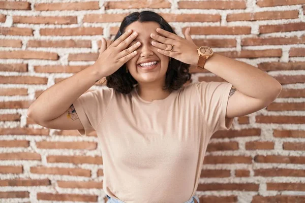 Young Hispanic Woman Standing Bricks Wall Covering Eyes Hands Smiling — Stock Photo, Image