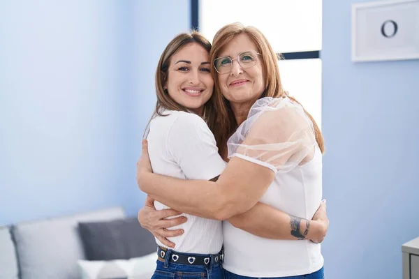 Mother Daughter Hugging Each Other Standing Home — 스톡 사진