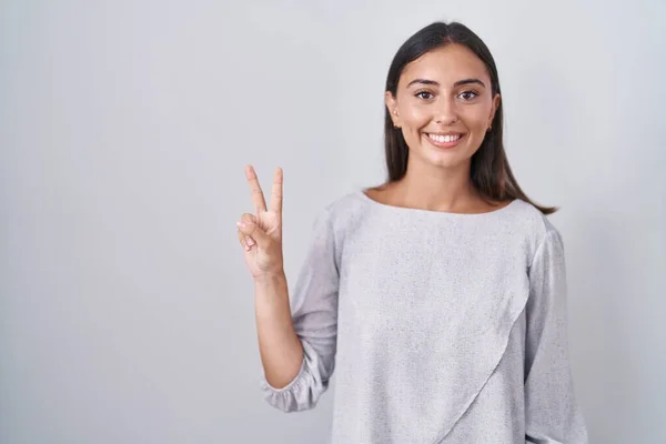 Young Hispanic Woman Standing White Background Showing Pointing Fingers Number — Photo