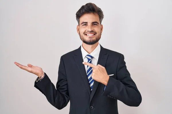 Young Hispanic Man Tattoos Wearing Business Suit Tie Amazed Smiling — Stock Photo, Image