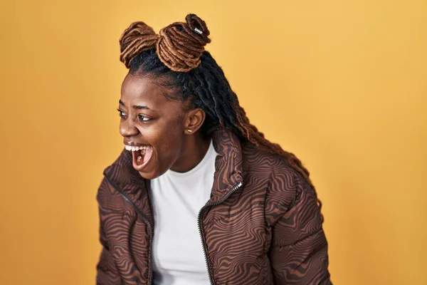 African Woman Braided Hair Standing Yellow Background Angry Mad Screaming — Stockfoto