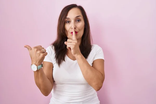 Middle Age Brunette Woman Standing Pink Background Asking Quiet Finger — Stock Photo, Image