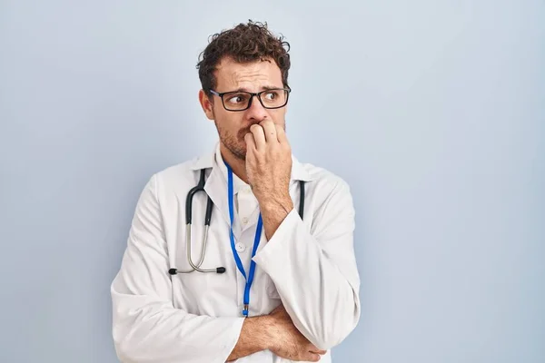 Young Hispanic Man Wearing Doctor Uniform Stethoscope Looking Stressed Nervous — Stock Photo, Image