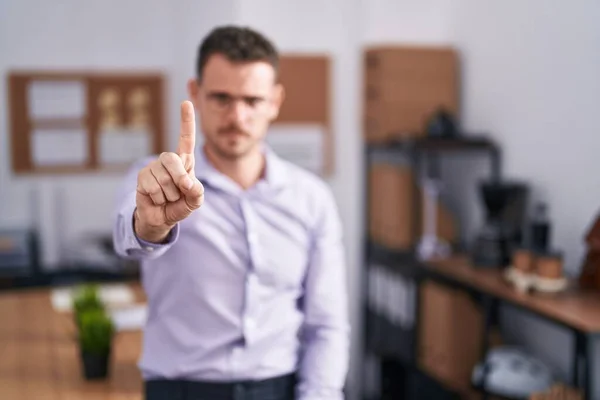 Young Hispanic Man Office Pointing Finger Angry Expression Showing Gesture — Stock Photo, Image