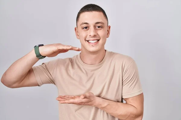 Young Man Standing Isolated Background Gesturing Hands Showing Big Large — Foto de Stock