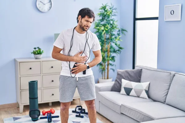 Handsome Latin Man Wearing Sportswear Home Hand Stomach Because Indigestion — Stock Photo, Image