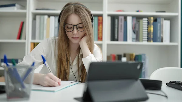 Young Blonde Woman Student Using Touchpad Writing Notebook University Classroom — Φωτογραφία Αρχείου