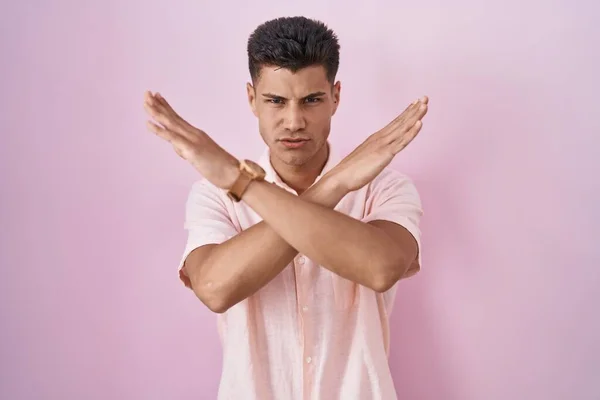 Young Hispanic Man Standing Pink Background Rejection Expression Crossing Arms — Fotografia de Stock