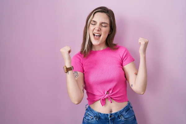 Blonde Caucasian Woman Standing Pink Background Celebrating Surprised Amazed Success — Stock Fotó