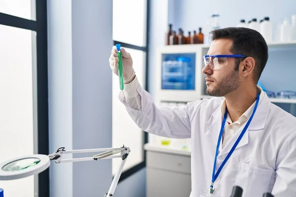 Young Hispanic Man Scientist Holding Test Tubes Laboratory — Stock Photo, Image