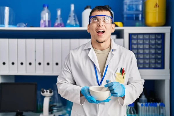 Young Arab Man Working Scientist Laboratory Angry Mad Screaming Frustrated — Stock Photo, Image