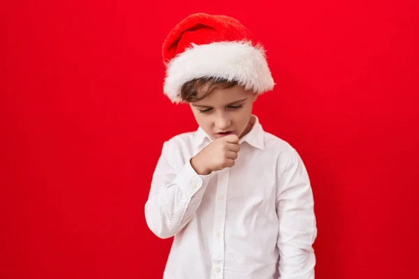 Little Caucasian Boy Wearing Christmas Hat Red Background Feeling Unwell — Stock Photo, Image