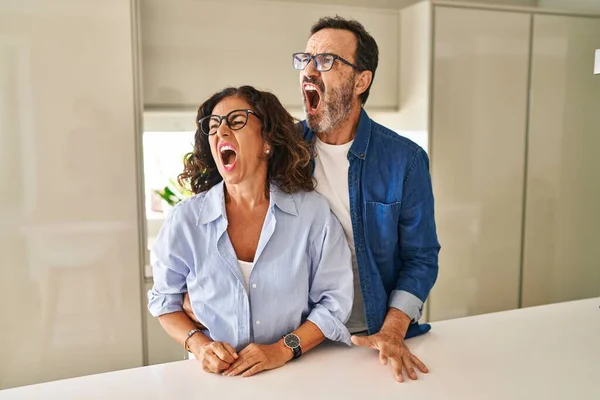 Middle Age Couple Standing Together Angry Mad Screaming Frustrated Furious — Fotografia de Stock