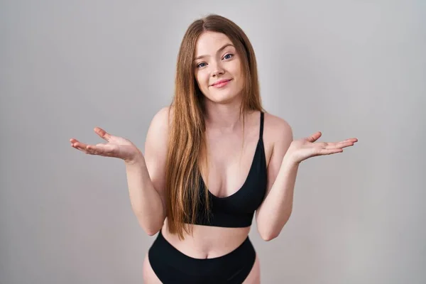 Young Caucasian Woman Wearing Lingerie Clueless Confused Expression Arms Hands — Stock Photo, Image
