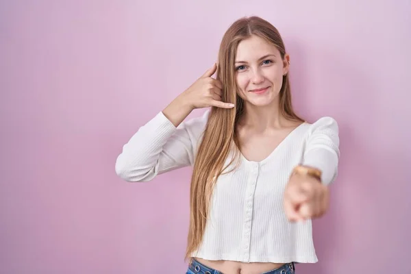 Young Caucasian Woman Standing Pink Background Smiling Doing Talking Telephone —  Fotos de Stock