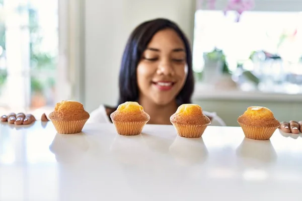 Hispanic Brunette Woman Looking Muffins Kitchen — Stock Photo, Image