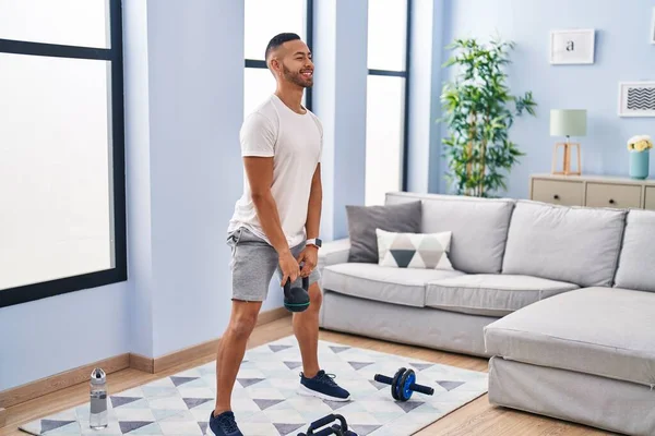 African American Man Smiling Confident Using Kettlebell Training Home — Foto Stock