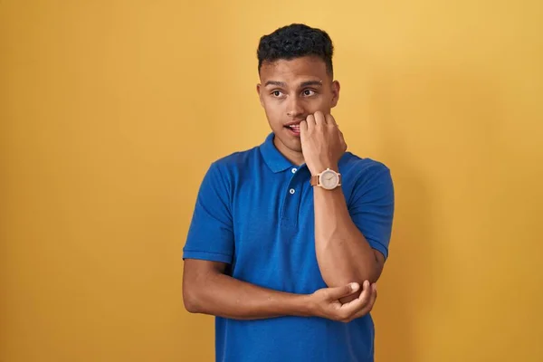 Young Hispanic Man Standing Yellow Background Looking Stressed Nervous Hands — Stock Photo, Image