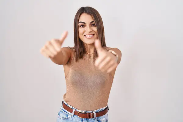 Young Hispanic Woman Standing White Background Approving Doing Positive Gesture — Stok fotoğraf