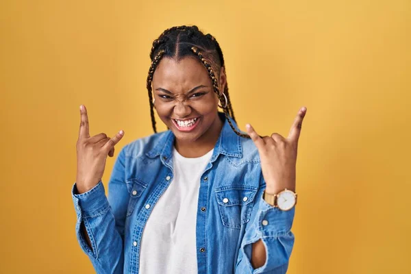 African American Woman Braids Standing Yellow Background Shouting Crazy Expression — Stock Photo, Image