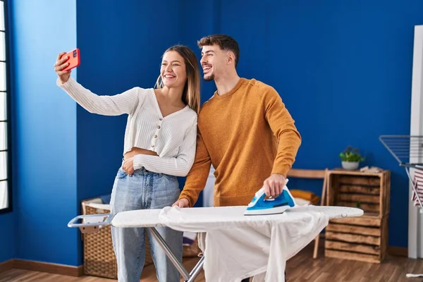 Young Man Woman Couple Ironing Clothes Make Selfie Smartphone Laundry — Stockfoto