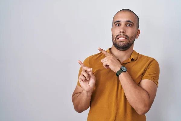 Hispanic Man Beard Standing White Background Pointing Aside Worried Nervous — Foto Stock