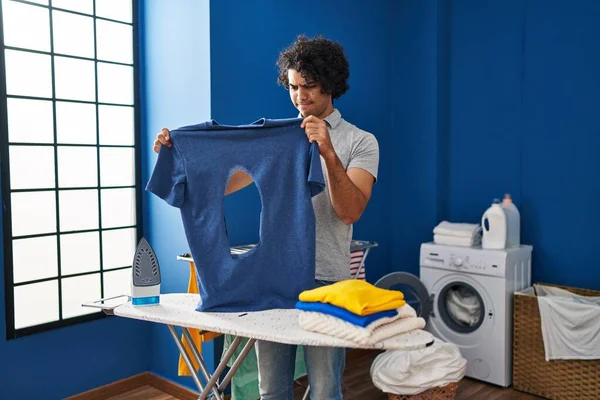 Hispanic Man Curly Hair Ironing Holding Burned Iron Shirt Laundry —  Fotos de Stock