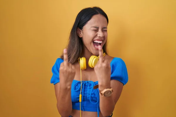 Hispanic Young Woman Standing Yellow Background Showing Middle Finger Doing — Foto Stock