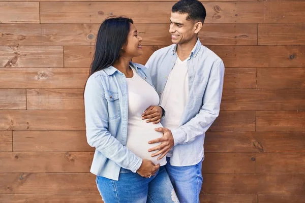Young Latin Couple Expecting Baby Touching Belly Street — Foto Stock