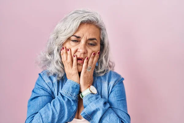 Middle Age Woman Grey Hair Standing Pink Background Tired Hands — Stock Photo, Image
