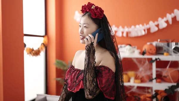 Young Chinese Woman Wearing Katrina Costume Talking Smartphone Home — Foto de Stock
