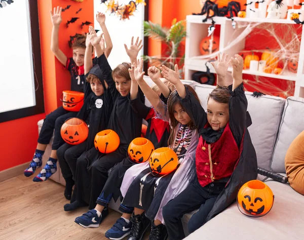 Group Kids Wearing Halloween Costume Hands Raised Home — Stock Photo, Image