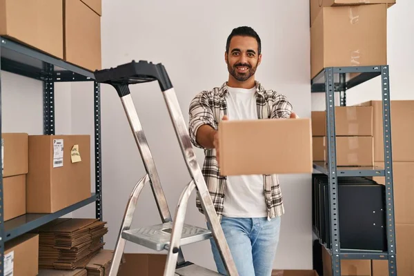 Young Hispanic Man Ecommerce Business Worker Holding Package Standing Office — Fotografia de Stock