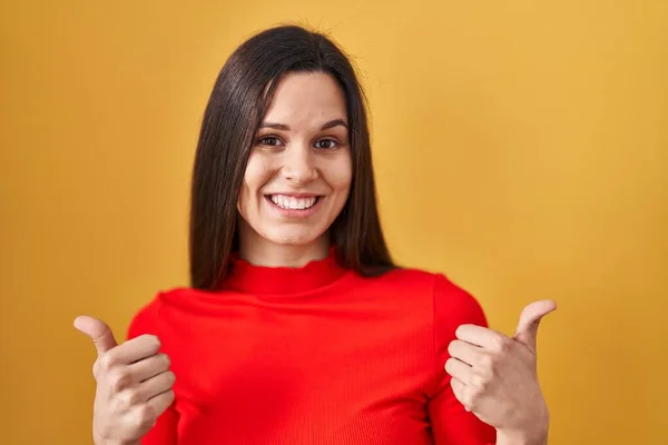 Young Hispanic Woman Standing Yellow Background Success Sign Doing Positive — Stock Photo, Image