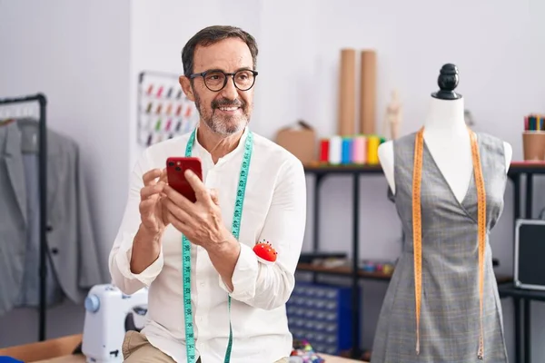 Middle Age Man Tailor Smiling Confident Using Smartphone Tailor Shop — Stock Fotó