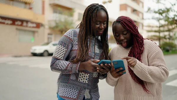Two African American Friends Smiling Confident Using Smartphone Street — Stock Photo, Image