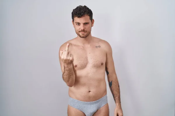 Young Hispanic Man Standing Shirtless Wearing Underware Showing Middle Finger — Stock Photo, Image