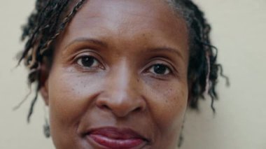 Middle age african american woman smiling confident standing at street
