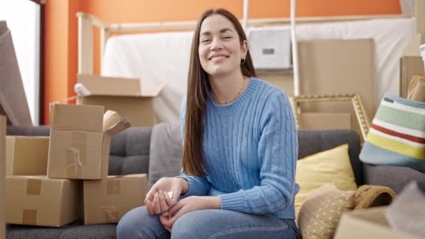 Young Caucasian Woman Holding Keys Sitting Sofa New Home — Stock Video