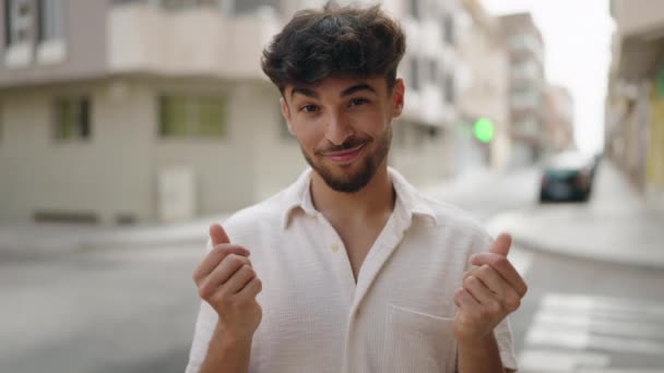 Young Arab Man Smiling Confident Doing Spend Money Gesture Street — Αρχείο Βίντεο