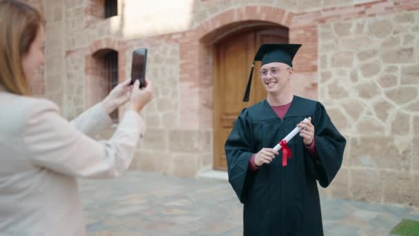 Man Woman Mother Graduated Son Making Photo Smartphone University — Stock Video